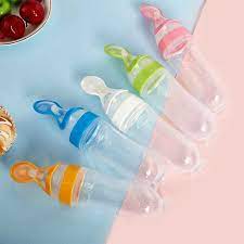 New Born Baby's Squeeze Feeding Silicon Bottle Spoon Feeder