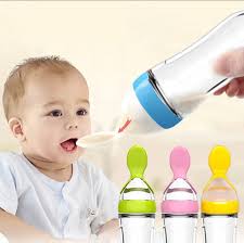 New Born Baby's Squeeze Feeding Silicon Bottle Spoon Feeder